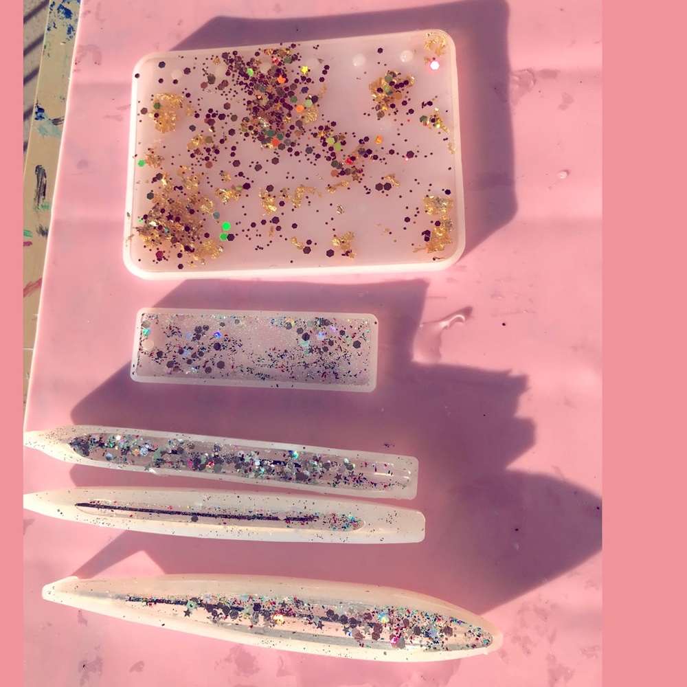 Resin pens , notebooks , etc